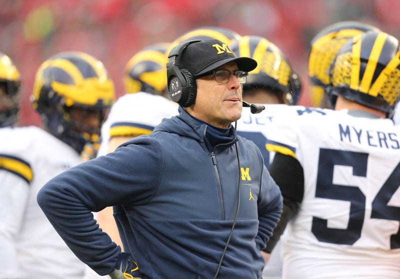 Michigan Wolverines head coach Jim Harbaugh looks up at the scoreboard during the second quarter against the Ohio State Buckeyes at Ohio Stadium.