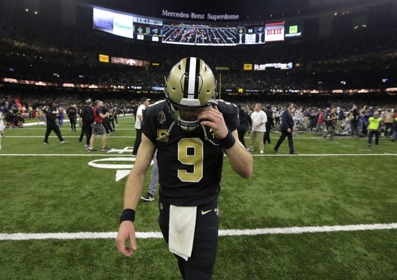 New Orleans, LA, USA; New Orleans Saints quarterback Drew Brees (9) leaves the field after losing to the Los Angeles Rams in the NFC Championship game