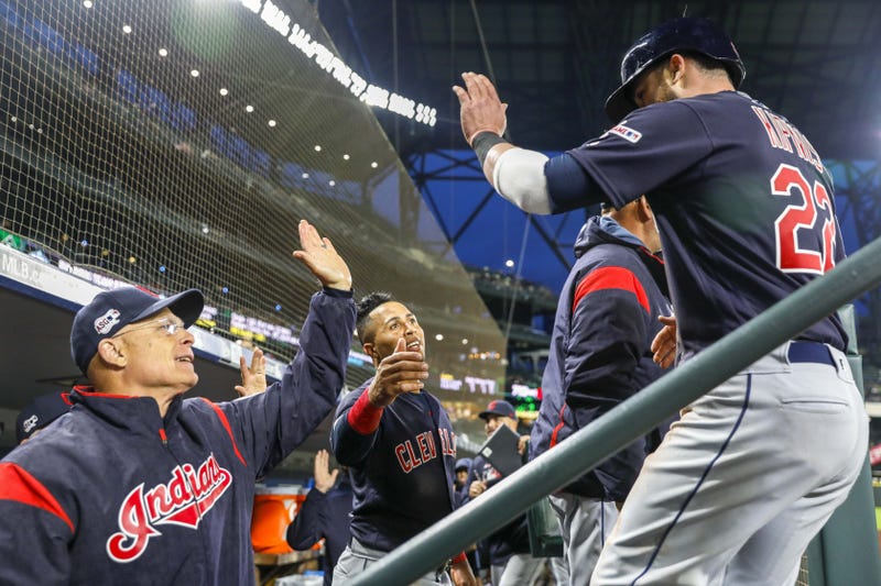 Apr 16, 2019; Seattle, WA, USA; Cleveland Indians second baseman Jason Kipnis (22) is greeted by center fielder Leonys Martin (2) and Cleveland Indians bench coach Brad Mills, left, after scoring a run against the Seattle Mariners during the fourth inning