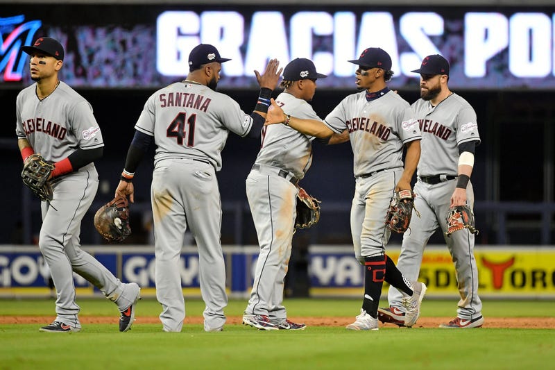 Cleveland Indians teammates celebrate after defeating the Miami Marlins at Marlins Park.