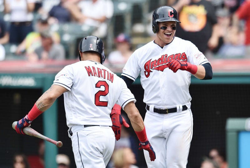 Cleveland Indians first baseman Jake Bauers, right, celebrates with Cleveland Indians center fielder Leonys Martin (2) after hitting a home run during the seventh inning against the New York Yankees at Progressive Field.