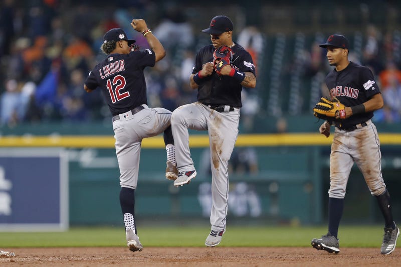 Cleveland Indians center fielder Leonys Martin (2) celebrates with shortstop Francisco Lindor (12) after the game against the Detroit Tigers at Comerica Park.
