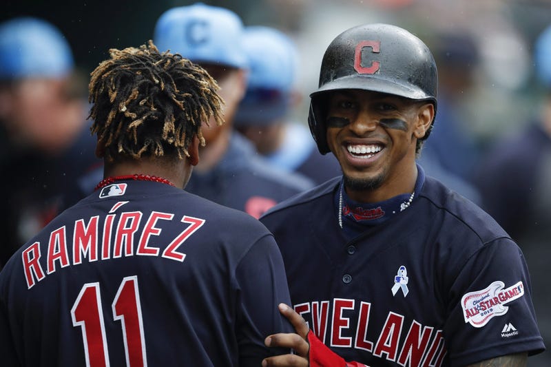 Jun 16, 2019; Detroit, MI, USA; Cleveland Indians shortstop Francisco Lindor (12) shares a laugh with second baseman Jose Ramirez (11) in the dugout during the third inning against the Detroit Tigers at Comerica Park. Mandatory Credit: Raj Mehta-USA TODAY