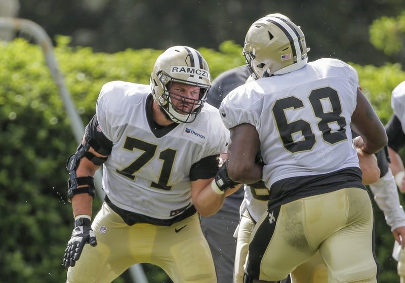 Jul 28, 2019; Metairie, LA, USA; New Orleans Saints offensive tackle Ryan Ramczyk (71) works against offensive tackle Derrick Kelly (68) during training camp at the Ochsner Sports Performance Center.