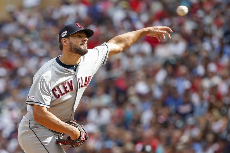 Cleveland Indians relief pitcher Brad Hand (33) throws to the Minnesota Twins in the ninth inning at Target Field.