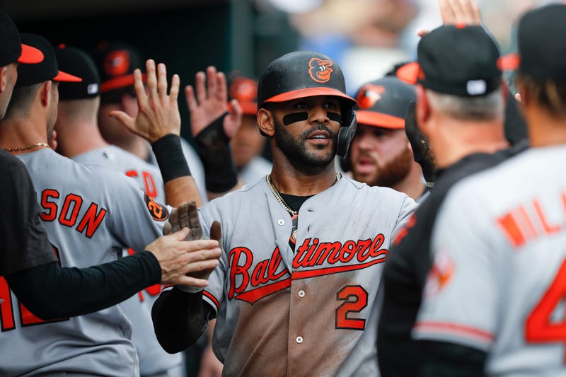 Jonathan Villar high-fives his Oriole teammates