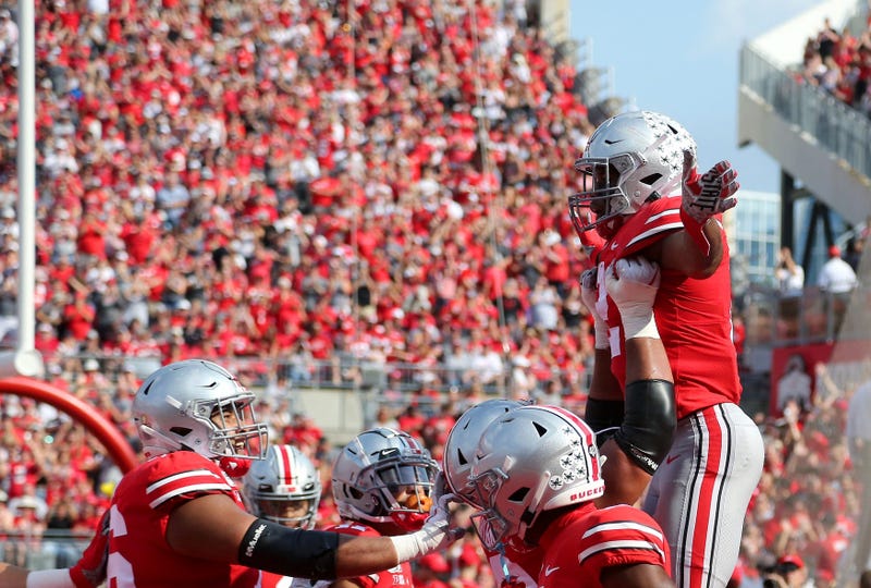 Ohio State Buckeyes running back J.K. Dobbins (2) celebrates after scoring a touchdown against the Miami (Oh) Redhawks during the second quarter at Ohio Stadium.