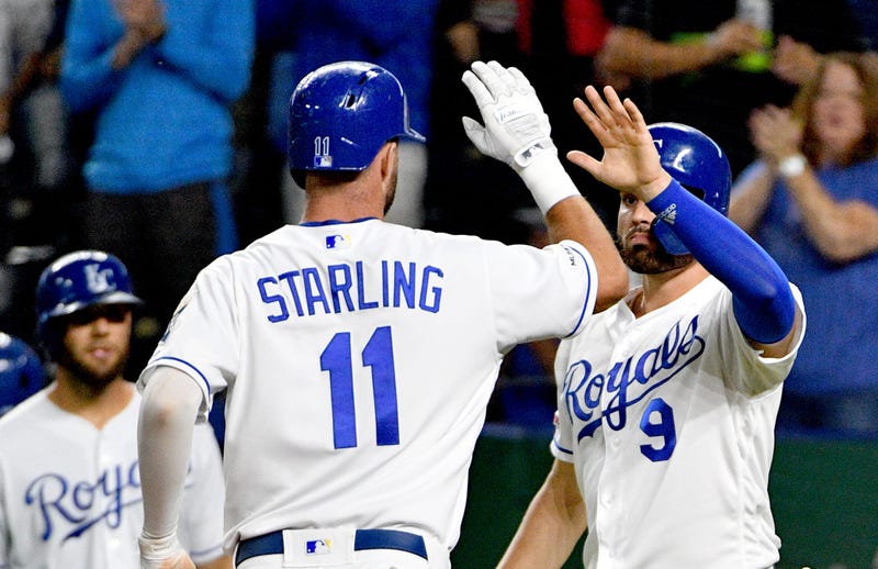 Sep 24, 2019; Kansas City, MO, USA; Kansas City Royals center fielder Bubba Starling (11) is congratulated by right fielder Ryan McBroom (9) after scoring in the third inning against the Atlanta Braves at Kauffman Stadium. Mandatory Credit: Denny Medley-U