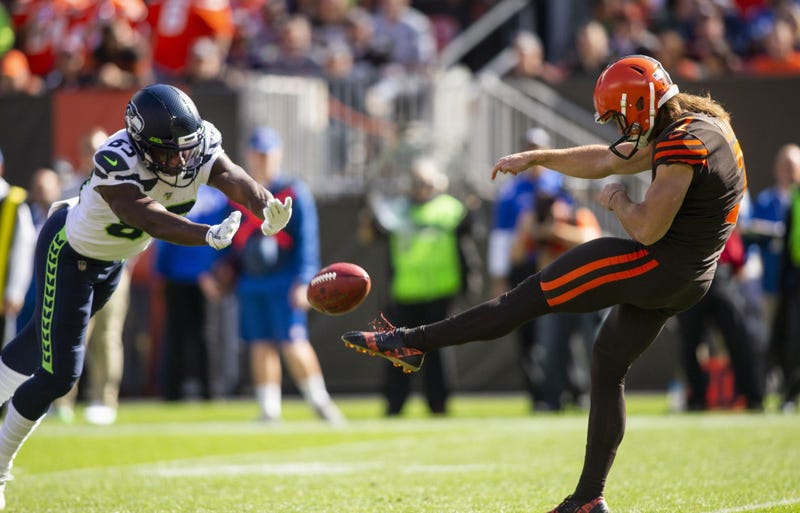 Oct 13, 2019; Cleveland, OH, USA; Seattle Seahawks wide receiver David Moore (83) blocks a punt by Cleveland Browns punter Jamie Gillan (7) during the second quarter at FirstEnergy Stadium. Mandatory Credit: Scott R. Galvin-USA TODAY Sports