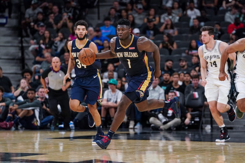 New Orleans Pelicans forward Zion Williamson (1) brings the ball up the court against the San Antonio Spurs at the AT&T Center.