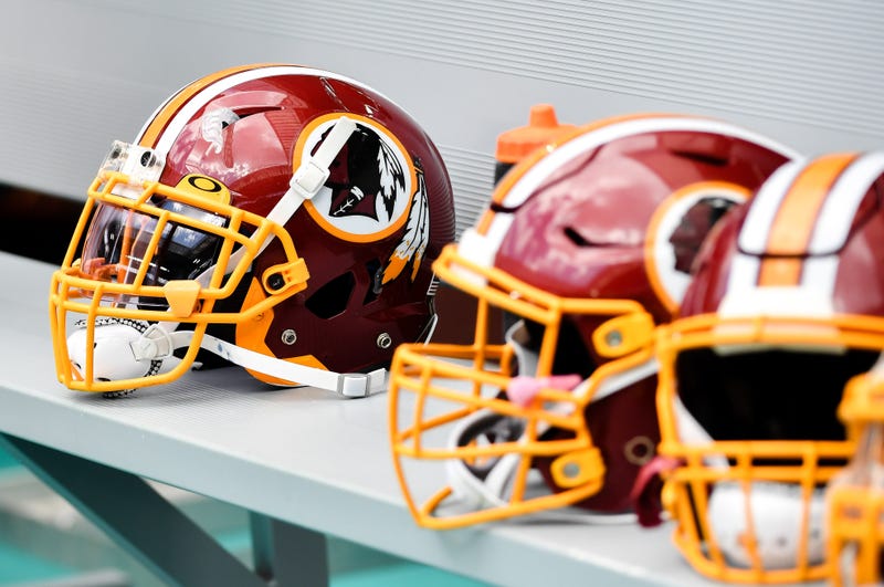Washington Redskins helmets are seen on the bench against the Miami Dolphins.