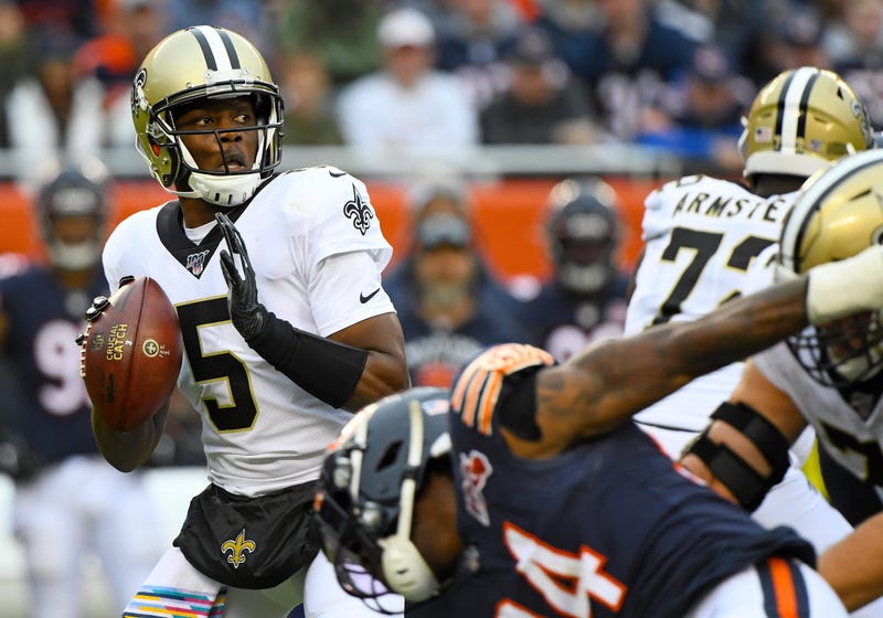 New Orleans Saints quarterback Teddy Bridgewater (5) drops back to a pass against the Chicago Bears during the first half at Soldier Field.