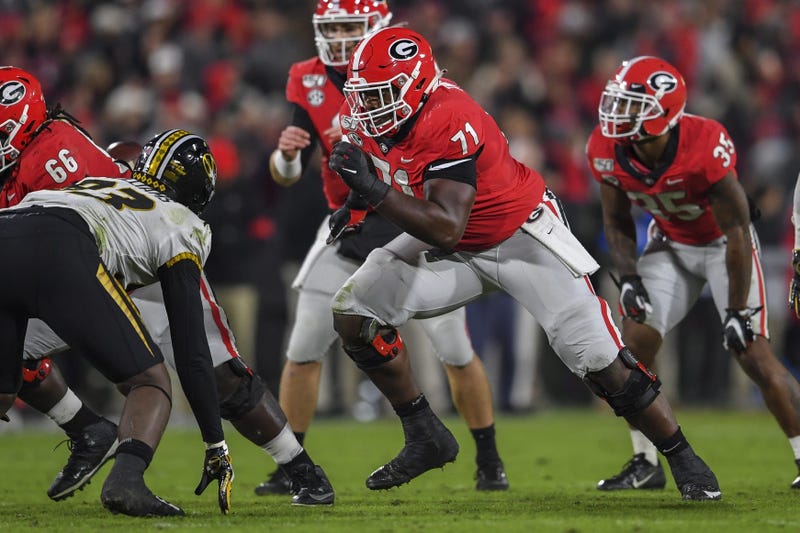 Georgia Bulldogs offensive lineman Andrew Thomas (71) blocks against the Missouri Tigers during the first half at Sanford Stadium.