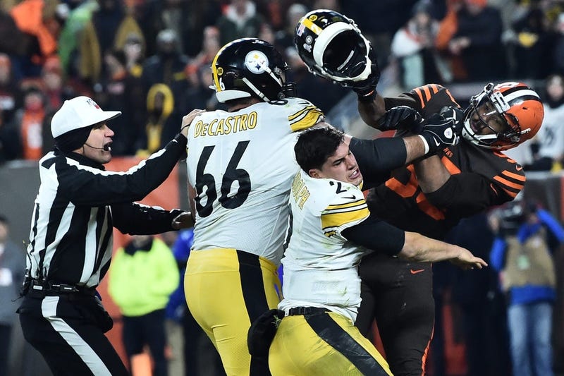 Cleveland Browns defensive end Myles Garrett (95) hits Pittsburgh Steelers quarterback Mason Rudolph