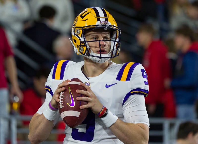 LSU Tigers quarterback Joe Burrow (9) warms up before the game against the Mississippi Rebels at Vaught-Hemingway Stadium.