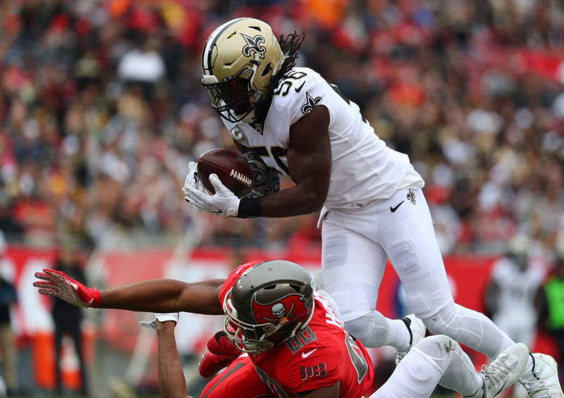 New Orleans Saints outside linebacker Demario Davis (56) intercepts a pass against Tampa Bay Buccaneers tight end O.J. Howard (80) during the first half at Raymond James Stadium.