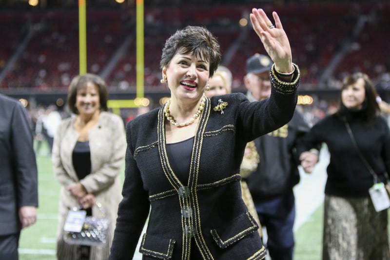 New Orleans Saints owner Gayle Benson waves to fans before a game