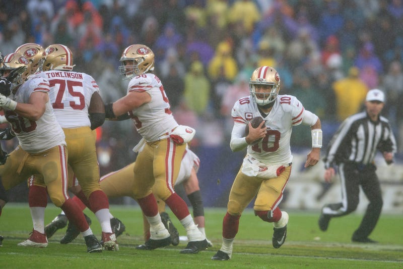 The rain pours down on Jimmy Garoppolo in Baltimore