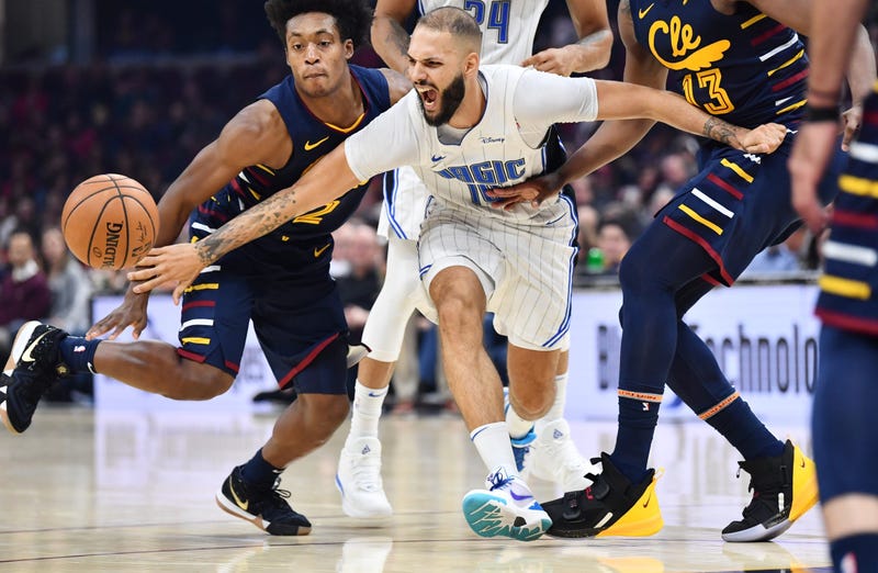 Dec 6, 2019; Cleveland, OH, USA; Cleveland Cavaliers guard Collin Sexton (2) and Orlando Magic guard Evan Fournier (10) fight for posession of the ball during the first half at Rocket Mortgage FieldHouse. Mandatory Credit: Ken Blaze-USA TODAY Sports