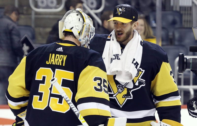 Pittsburgh, PA, USA; Pittsburgh Penguins goaltender Tristan Jarry (35) is congratulated by fellow goaltender Matt Murray