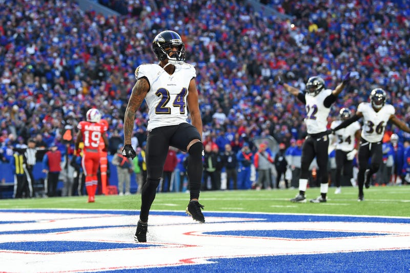 Baltimore Ravens cornerback Marcus Peters (24) reacts to his defensive play against the Buffalo Bills during the fourth quarter at New Era Field.