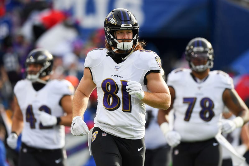 Hayden Hurst takes the field with his Ravens teammates