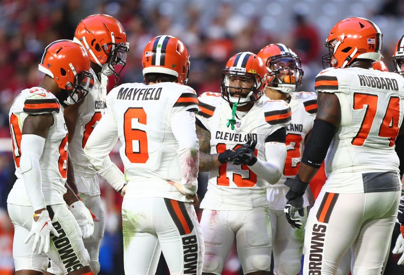 Cleveland Browns wide receiver Odell Beckham Jr. (13) in the huddle with quarterback Baker Mayfield (6) against the Arizona Cardinals at State Farm Stadium.