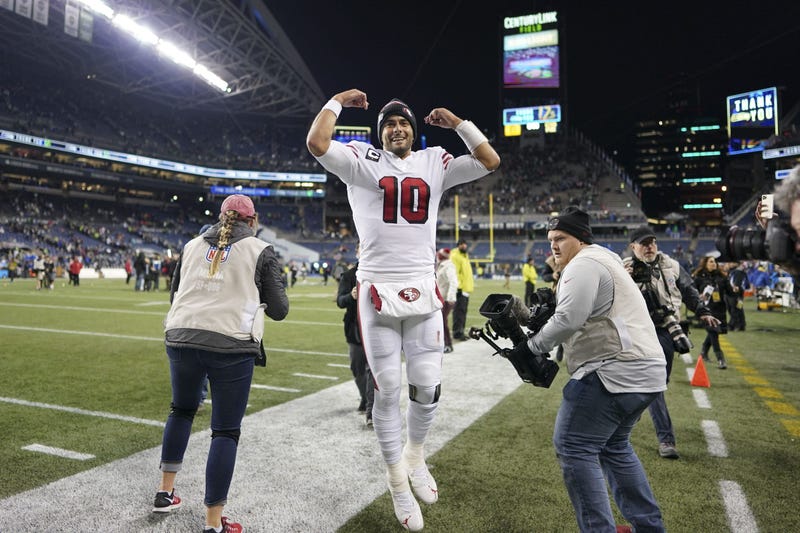 Jimmy Garoppolo celebrates 49ers' NFC West clinching win