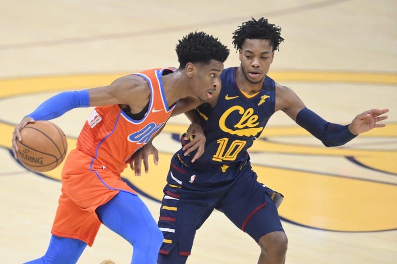 Jan 4, 2020; Cleveland, Ohio, USA; Oklahoma City Thunder guard Shai Gilgeous-Alexander (2) drives against Cleveland Cavaliers guard Darius Garland (10) in the first quarter at Rocket Mortgage FieldHouse. Mandatory Credit: David Richard-USA TODAY Sports