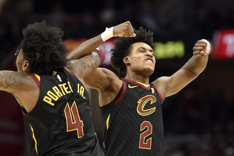 Feb 12, 2020; Cleveland, Ohio, USA; Cleveland Cavaliers guard Kevin Porter Jr. (4) and guard Collin Sexton (2) celebrate in the third quarter against the Atlanta Hawks at Rocket Mortgage FieldHouse. Mandatory Credit: David Richard-USA TODAY Sports