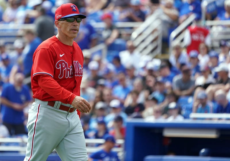 Philadelphia Phillies manager Joe Girardi (25) walks to make a pitching change against the Toronto Blue Jays during the third inning at TD Ballpark.