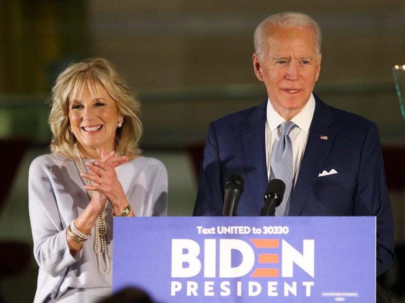 Joe Biden, with Jill Biden at his side, gives remarks at the National Constitution Center in Philadelphia after his 'Big Tuesday' primary election night campaign event in Ohio was cancelled due to coronavirus concerns.