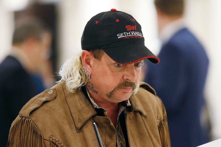 Joe Exotic, Hat, Earring, Staring, Filing, 2018