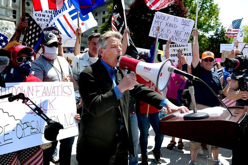 Protesters broke through barriers to gather around speaker, State Rep. Russ Diamond, R-Lebanon, who gave a speech during a Reopen PA rally in Harrisburg Friday, May 15, 2020