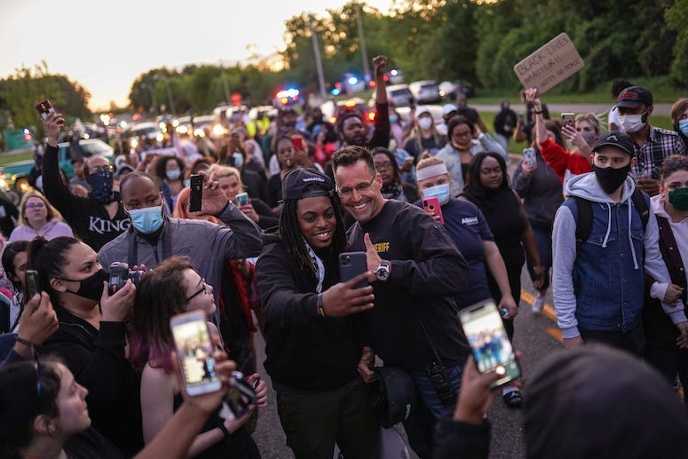 Chris Swanson, Genesee County Sheriff, Police, Selfie, March, Protest, Crowd