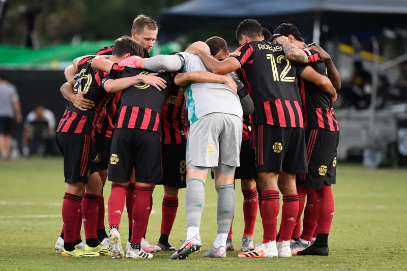 Jul 21, 2020; Kissimmee, FL, USA; Atlanta United starting line up huddle up the field prior to the game against the Columbus Crew at ESPN Wide World of Sports. Mandatory Credit: Douglas DeFelice-USA TODAY Sports