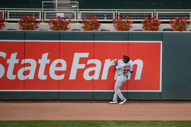 Cleveland Indians left fielder Daniel Johnson (23) looks on at Minnesota Twins left fielder Eddie Rosario (20) (not picutred) solo home run during the fourth inning at Target Field