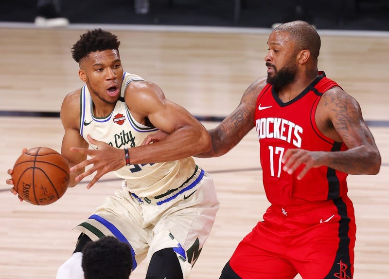 Giannis drives on PJ Tucker