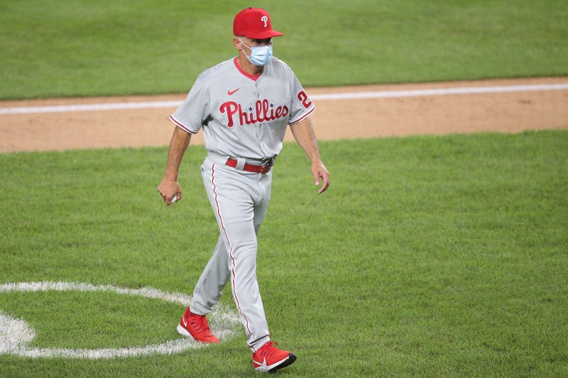 Philadelphia Phillies manager Joe Girardi walks off the field after making a pitching change during the sixth inning against the New York Yankees at Yankee Stadium.