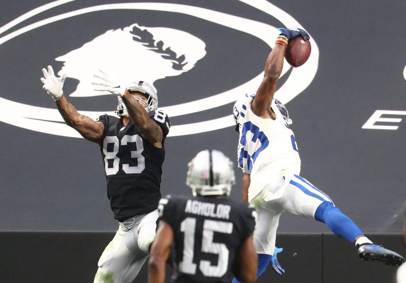 Indianapolis Colts cornerback Kenny Moore II (23) makes a one handed interception catch against Las Vegas Raiders tight end Darren Waller (83) at Allegiant Stadium.