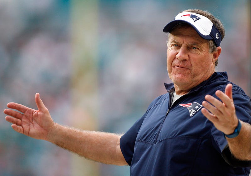 New England Patriots head coach Bill Bellichick coach gestures between plays in the second half against the Miami Dolphins at Sun Life Stadium. The Dolphins defeated the Patriots 20-10.