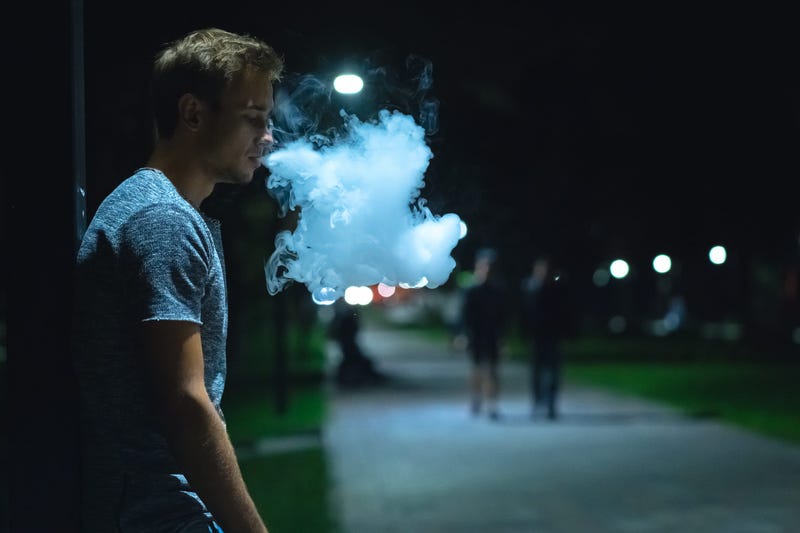 Vape smoker at night