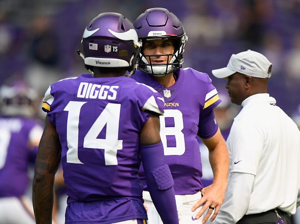Vikings QB Kirk Cousins chats with former wide receiver Stefon Diggs.