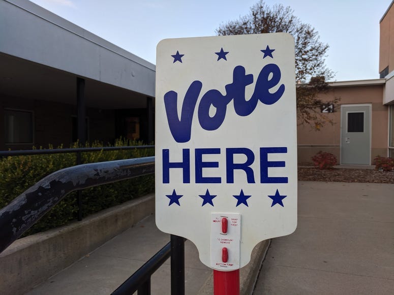 vote here sign