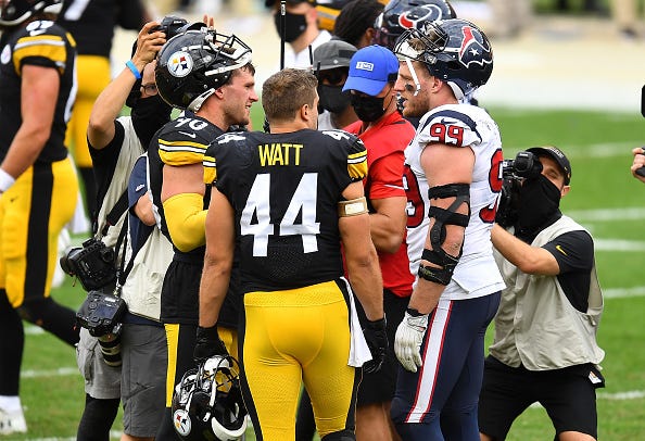 The Watt brothers chat after a Steelers-Texans game.