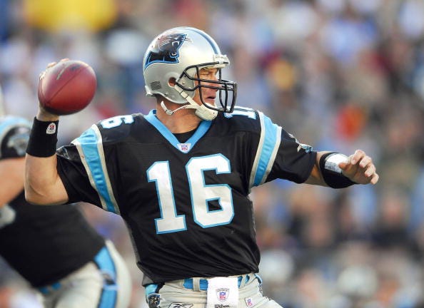 Chris Weinke throws a pass for the Panthers.