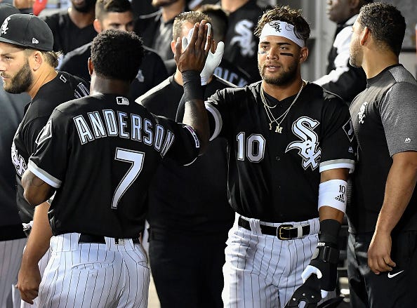 Yoan Moncada celebrates a home run with Tim Anderson