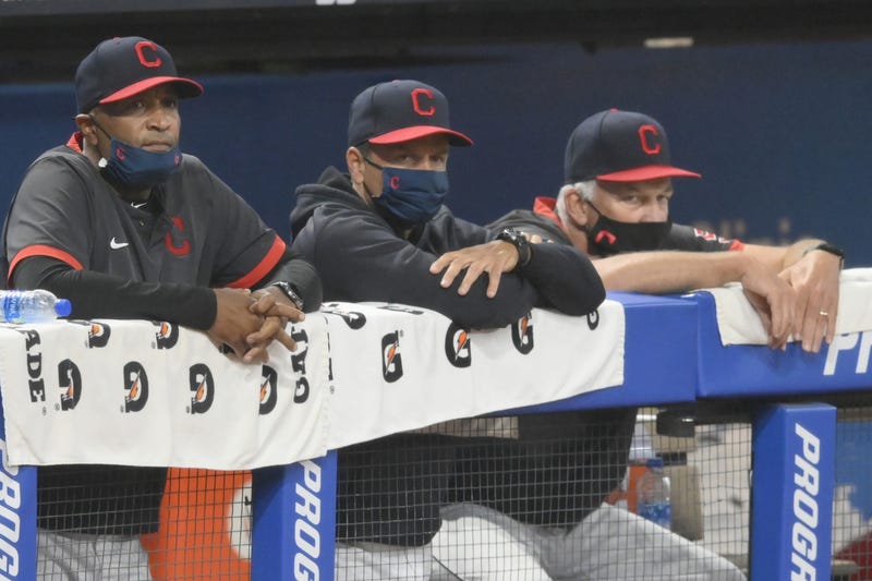 Cleveland Indians acting manager Sandy Alomar Jr, left, bench coach Mike Sarbaugh, center, and pitching coach Carl Willis watch from the dugout in the eighth inning against the Kansas City Royals at Progressive Field.