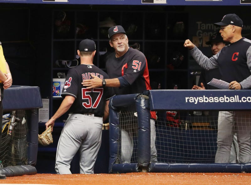 Indians starting pitcher and Cy Young winner Shane Bieber and pitching coach Carl Willis