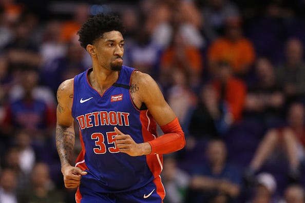 Christian Wood jogs down the court for the Pistons.